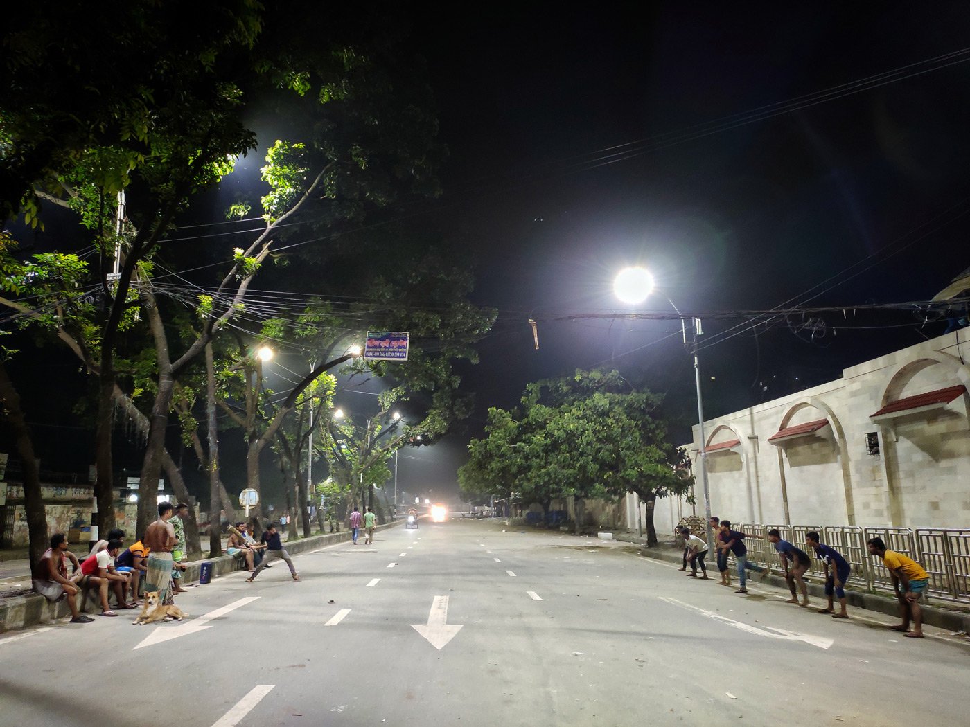 Who says you need a vehicle to drive on the road? A game in the wee hours of the morning in Dhaka